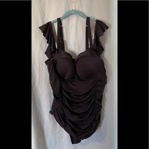 Swimsuit size 4x, black with flattering ruching and great tummy control 😊